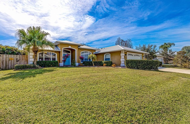 Fantastic home near beaches & docks with heated saltwater pool & office