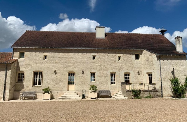 Farmhouse in a working winery with vineyard views