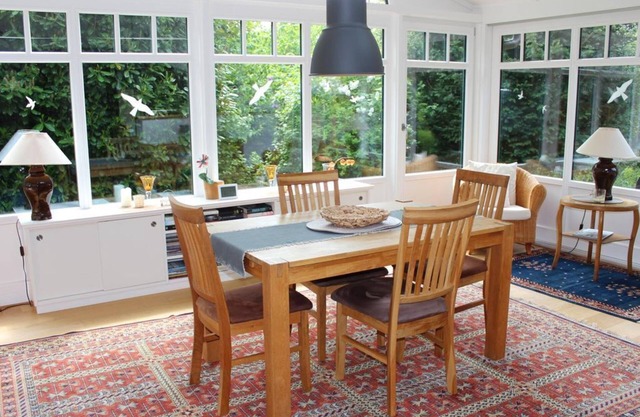 Ferienwohnung Wintergarten - Ferienhaus "Am Deich 30"