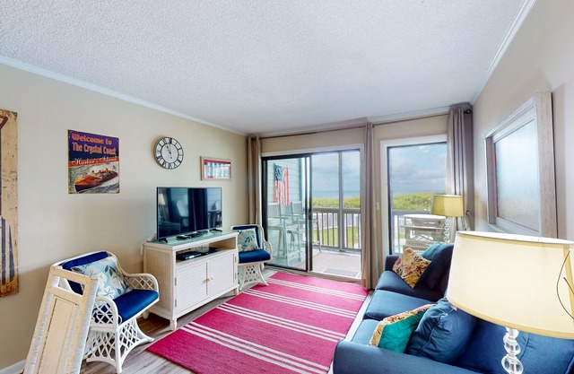 First-Floor, Oceanfront Condo with a Beach View, WiFi, W/D & Shared Pool