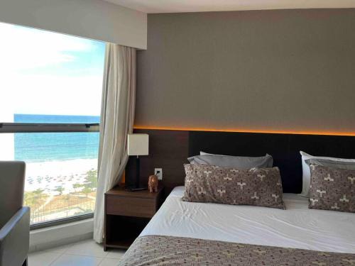 Flat na Praia em HOTEL DE LUXO (1001)