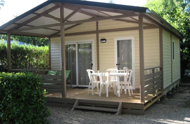 Flower Camping le Pilon d'Agel * - Chalet Soléa Comfort 40m2 - 2 bedrooms + air conditioning + TV - of which covered terrace of 13m2 5 people
