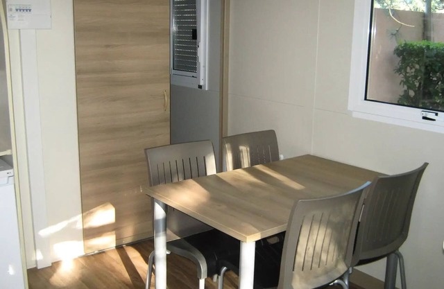 Flower Camping le Pilon d'Agel * - Chalet Némo Confort 3 rooms 4 people Air-conditioned