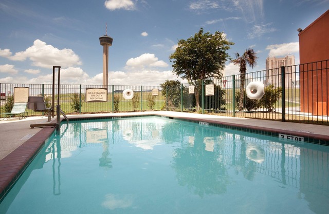 Free Breakfast + Outdoor Pool + 24-Hour Business Center | Only 3 Blocks from Gonzalez Convention Center