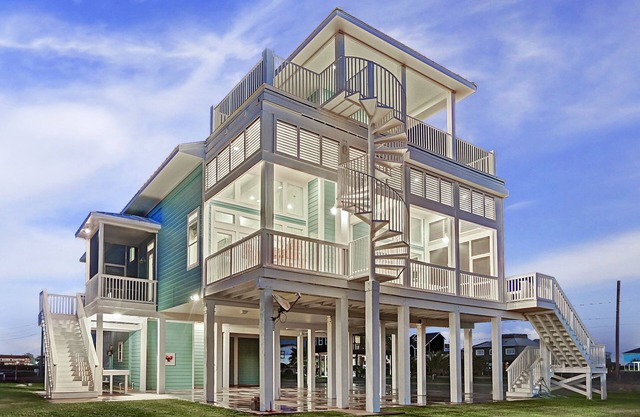 Get the best of both worlds, beach & bay, in this luxurious waterfront home.