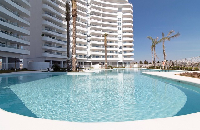 Global Properties: Apartment with terrace, sea and pool views