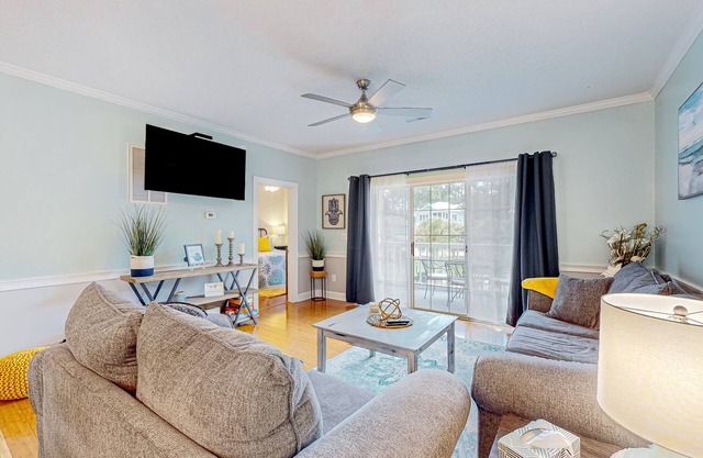 Golf-club adjacent condo with a washer/dryer, elevator, & on-site pool