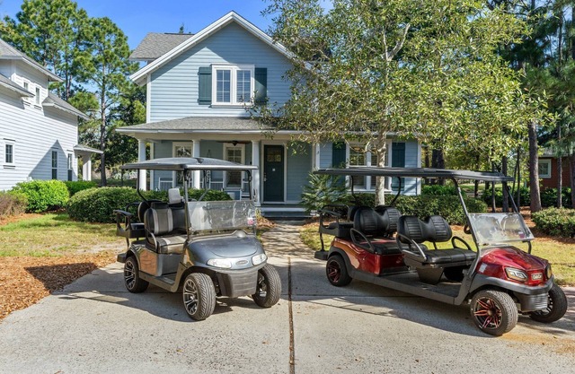 Golf Course Beach Cottage with 2 Golf Carts! Near Beach, Pool, Hot tub, Tram.