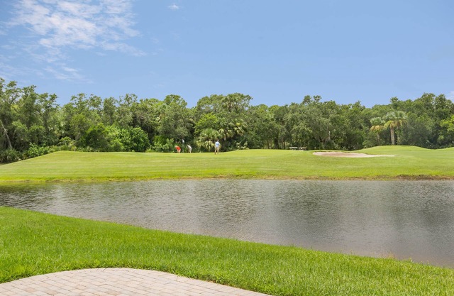 Golf Course View Townhouse with a 2 Car Garage. Water Views! 1929T