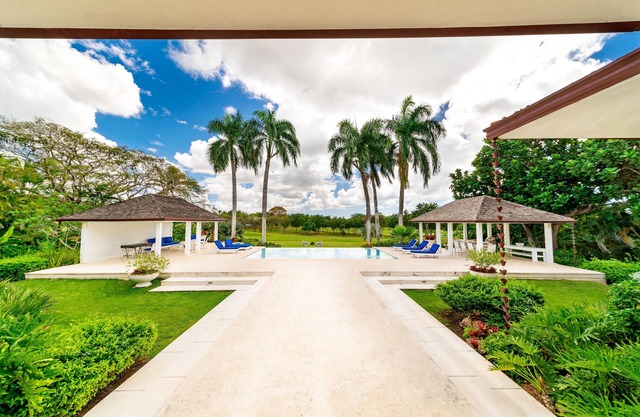 Golf-facing, bright, spacious fully staffed villa - walking distance to beach.