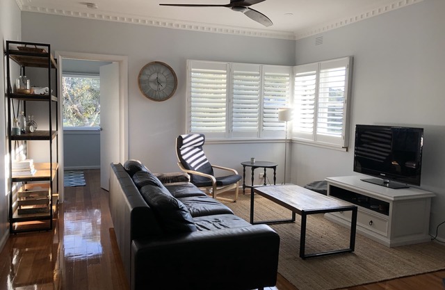 Gorgeous beach house located near shops & beach No 1. Free WiFi. Fully fenced.