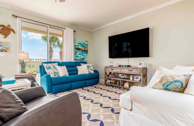 Ground-floor condo next to on-site pool with private patio & beach access