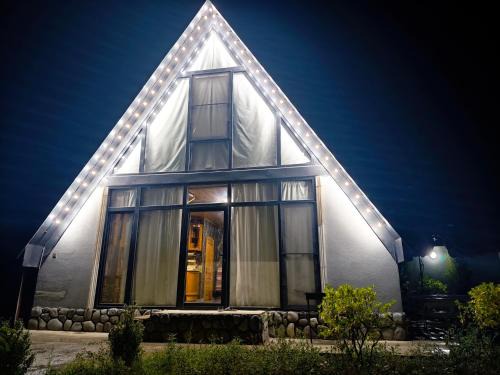 Guba A-frame near forest & lake