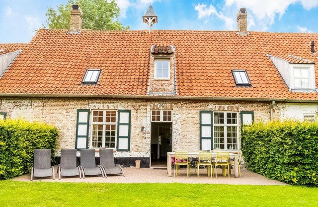 Historic Farmhouse in the middle of polder landscape Damme