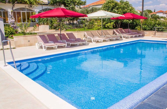 Holiday apartment with pool and 80 m to the beach