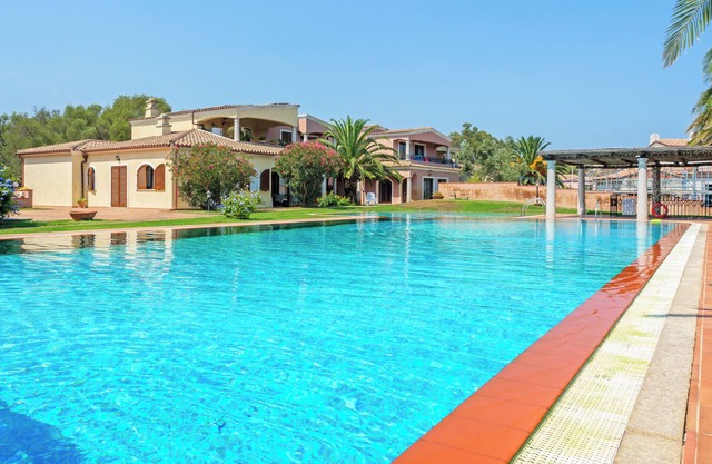 Holiday Apartment "Residence Le Palme" with Mountain View, Shared Pool & Wi-Fi