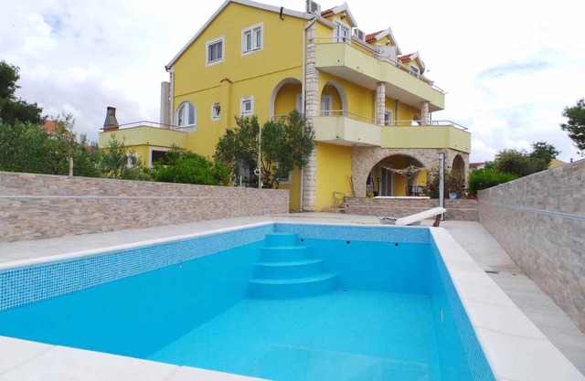 Holiday apartment with balcony and air conditioning