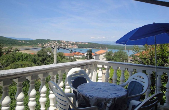 Holiday apartment with air conditioning and terrace with sea view