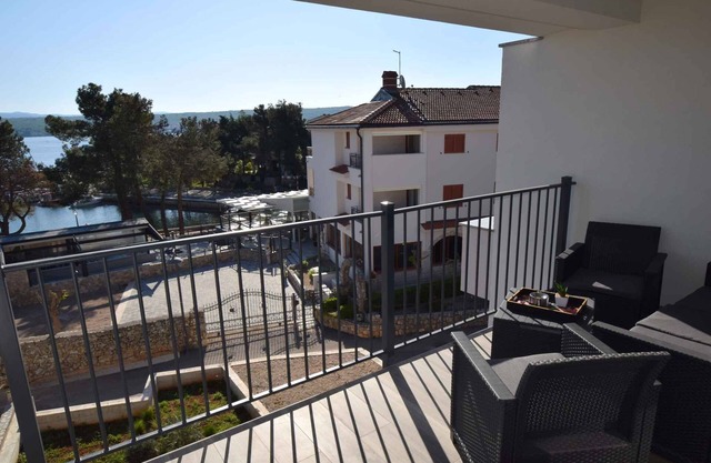 Holiday apartment with balcony and sea view