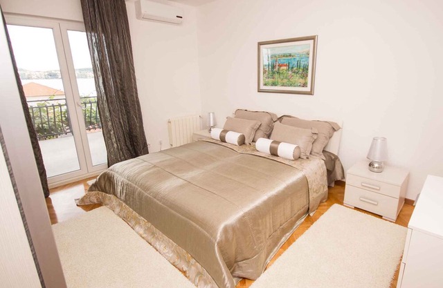 Holiday apartment with pool and 80 m to the beach