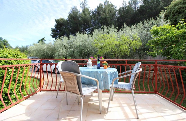 Holiday apartment with terrace and air conditioning