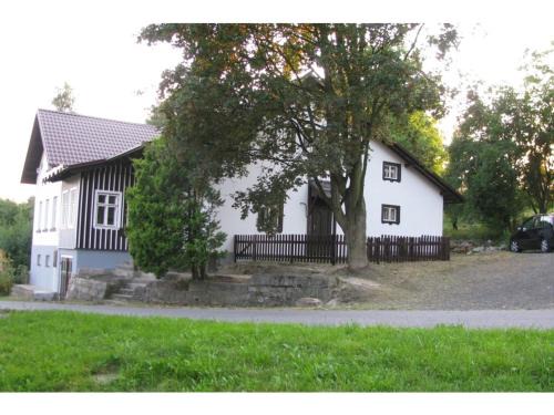 Holiday home in a quiet authentic mountain village with a view of the surrounding hills