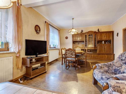 Holiday home in Thuringia with private terrace use of a garden and pool