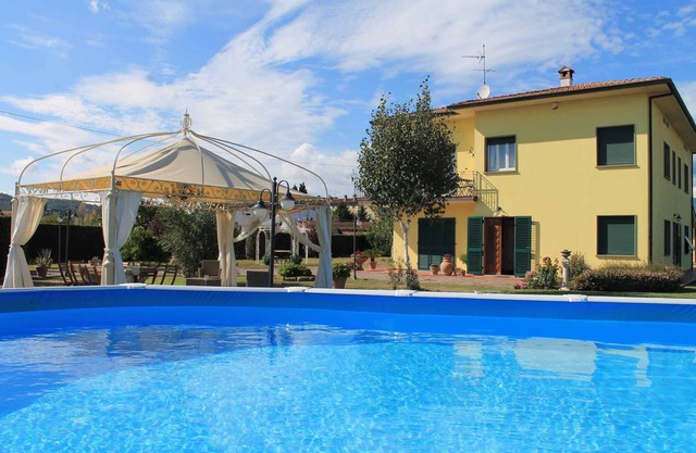 Holiday home with pool and air conditioning