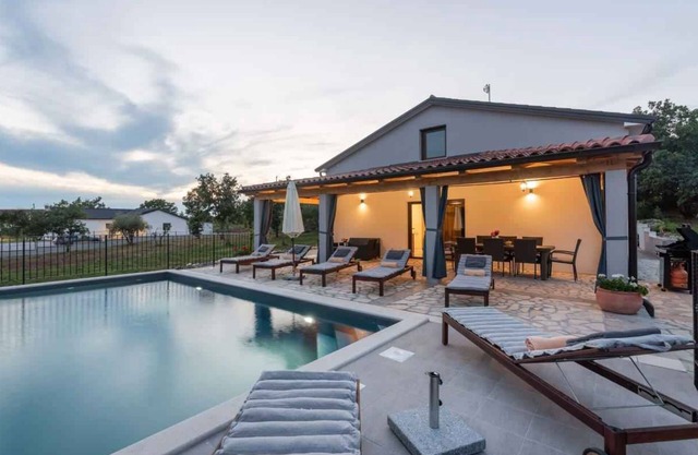 Holiday home With a large garden pool