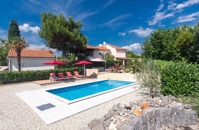 Holiday home with pool and fenced garden