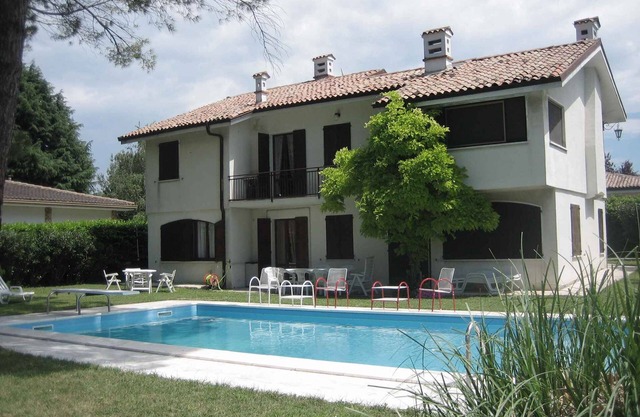 Holiday home with terrace and pool