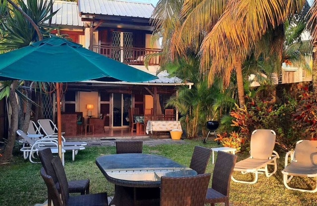 Homely beachfront villa with beautiful sandy beach and safe swimming.