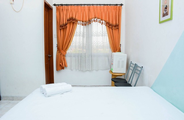 Homey Studio Apartment At Margonda Residence 1