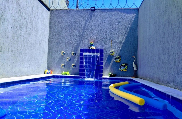 House in a gated community in Itanhaém, swimming pool, garage, barbecue and Wi-Fi