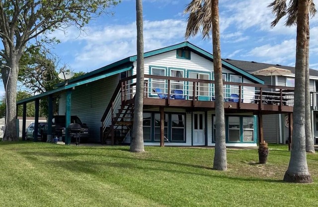 House on intercoastal with lighted fishing pier