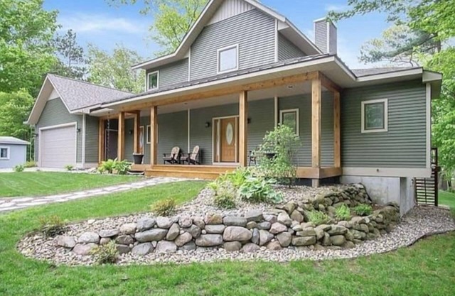Huge Home on Bar Lake across from Lake Michigan