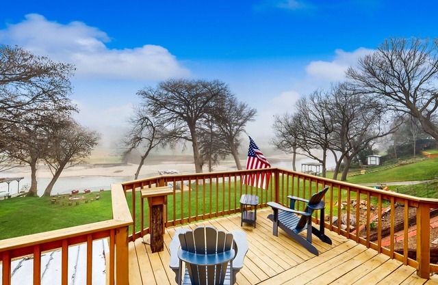 Idyllic waterfront getaway with private hot tub & deck views - near golf