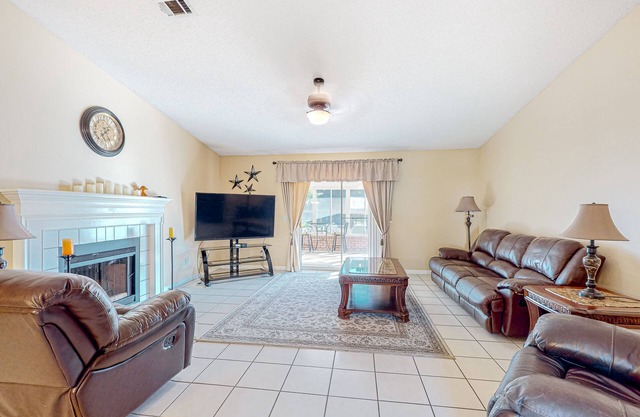 Inviting dog-friendly home with pool, hot tub, enclosed yard, & W/D
