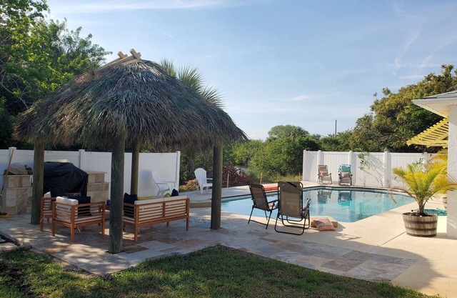 Island State of Mind! Amazing backyard on water with heated pool!