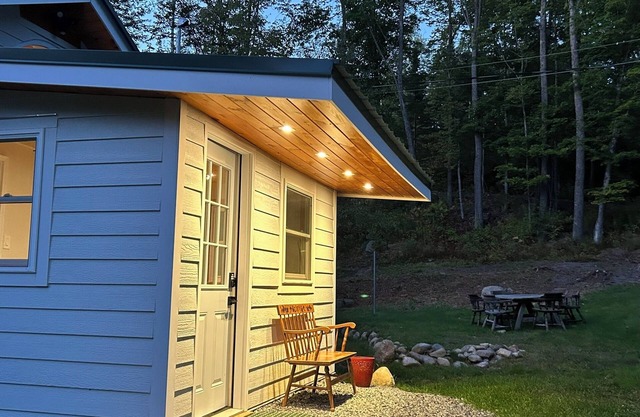 Just listed! Remodeled, brookside cottage nestled in private, 20-acre forest