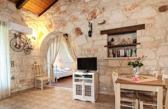 Kavos Psarou stone and wooden built sea front sea view traditional/lux villa