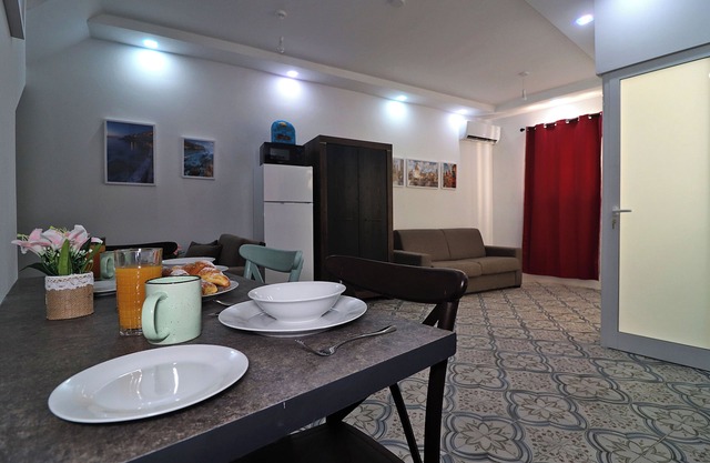 La Corte TriHouse A Modern Home Minutes from the Three Cities.”
