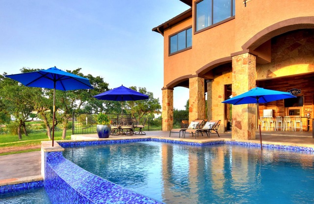 Lake Travis Waterfront Home w/ views, Pool, Dock, Outdoor Kitchen, Open-Air Bar