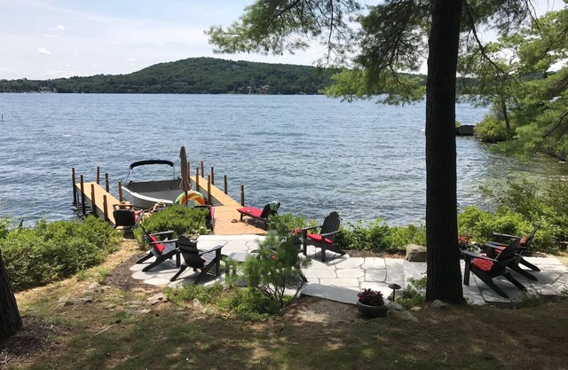 Lake Winnipesaukee lakefront cottage with private coveand 300' of lake frontline