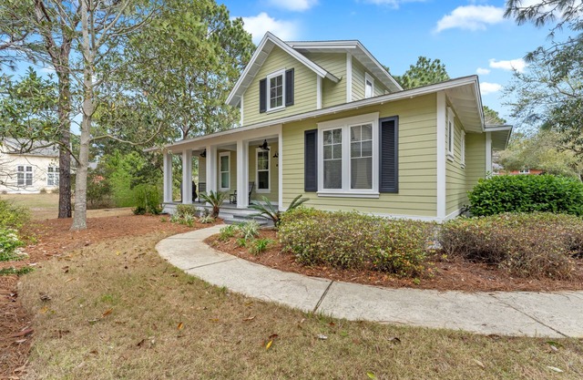 Lakefront Beach Cottage w/ 2 Golf Carts, Lake Views, Pool, Beach, Beach Tram.