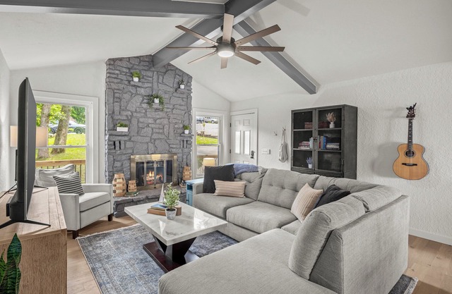 Lakefront, luxury beds, hot tub, fire pit, game room, private dock & boathouse.