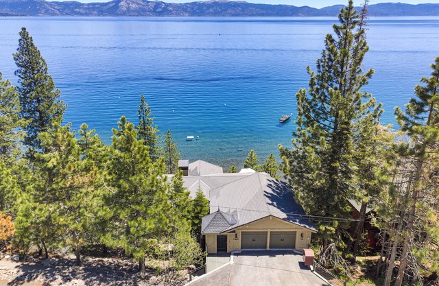 Lakefront Tahoe home with a PRIVATE PIER, PRIVATE BEACH & STUNNING VIEWS!