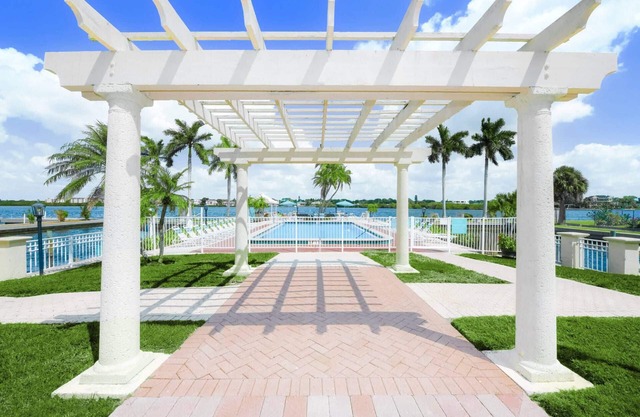 Lower Pricing! Palm Bay Private Beach, 2 Heated Pools | Hot Tub | Bay Sunrises, Ready to Book!