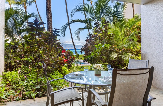 Lush tropical setting steps away from sea breezes