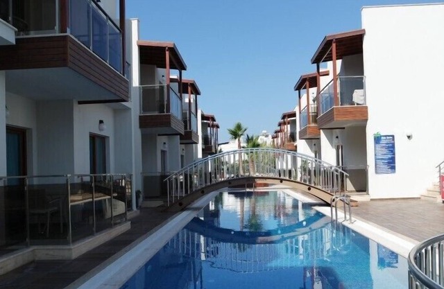 luxurious 2 bedroom ground floor apartment with communal swimming pool.